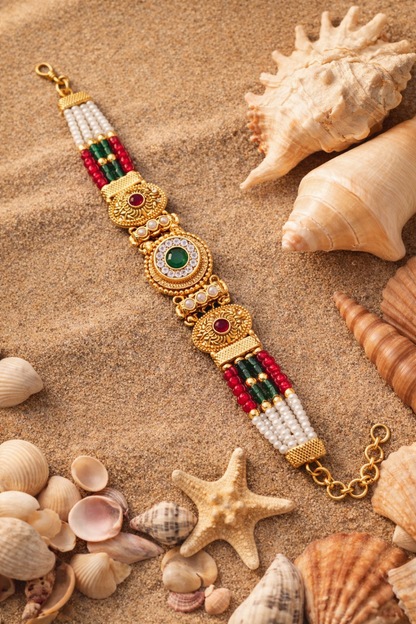 Traditional Pearl Beaded Gold Bracelet with Ruby & Emerald Stone Design