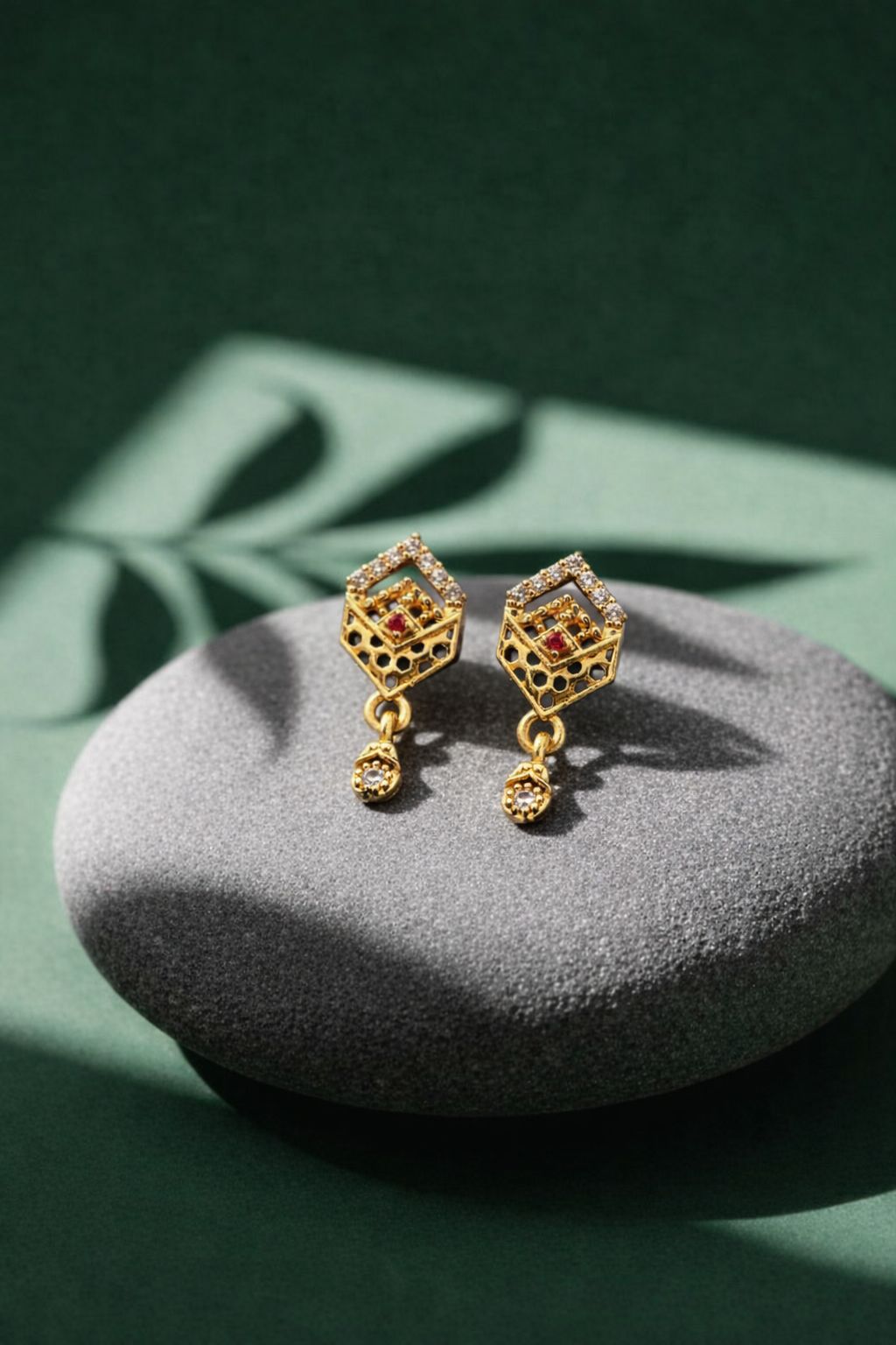 Stylish Gold Hexagon CZ Drop Earrings with Ruby Accent
