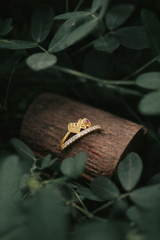 Designer Symbol Gold Ring with Ruby Accent and Diamond Band