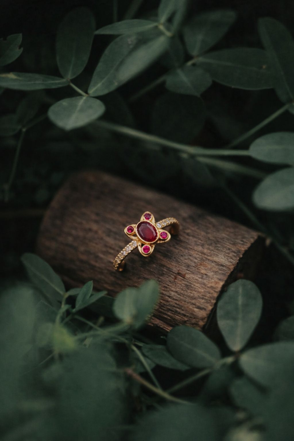 Elegant Floral Ruby Gold Ring with Diamond Accent Band