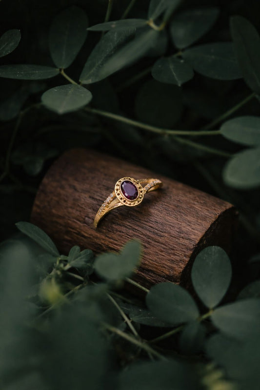 Elegant Oval Ruby Stone Gold Ring with Diamond Accent Band
