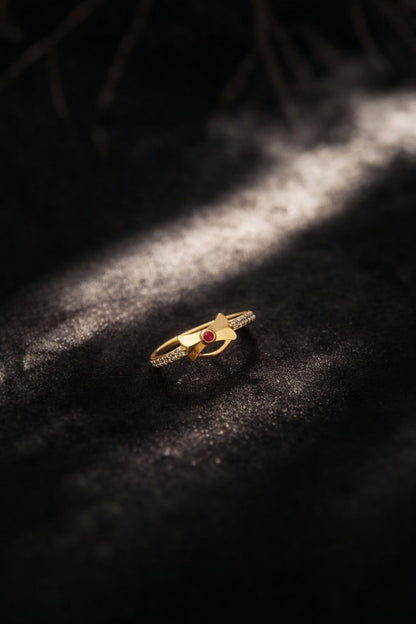 Elegant Bow Design Gold Ring with Ruby Center Stone