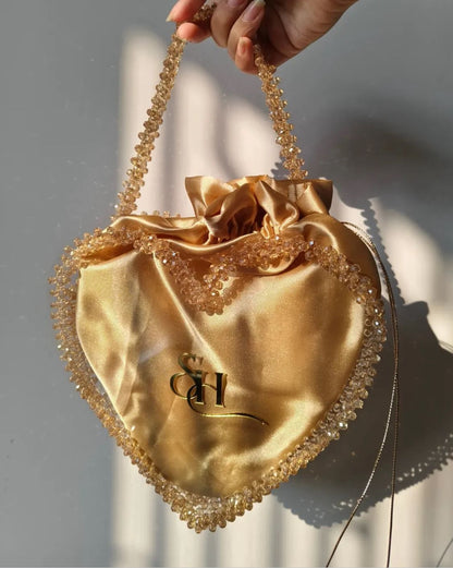 Golden Satin Heart Potli Bag with Crystal Beaded Handle