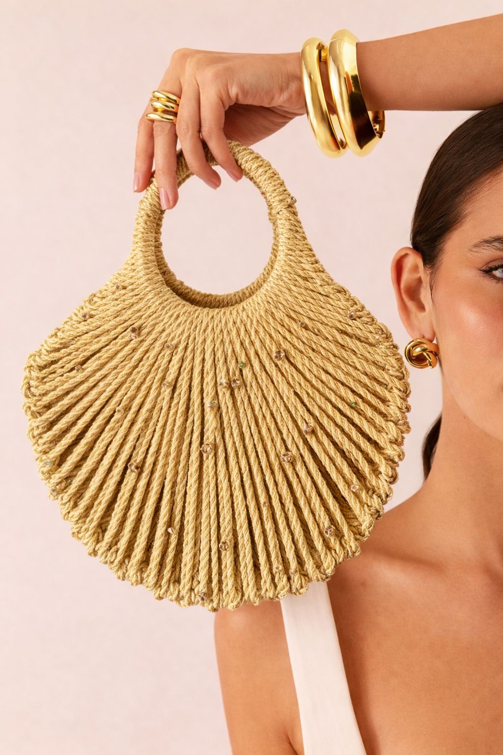 Golden Handwoven Circular Handle Statement Bag