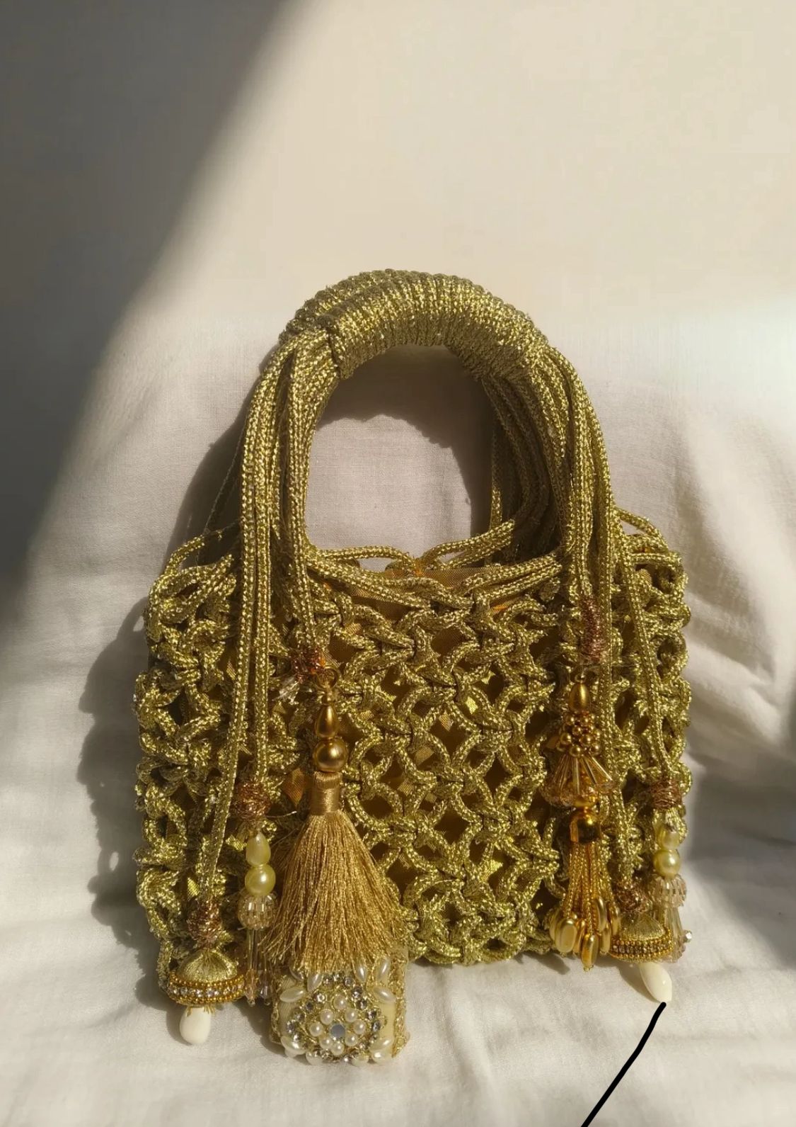 Golden Handwoven Tassel Mini Potli Bag