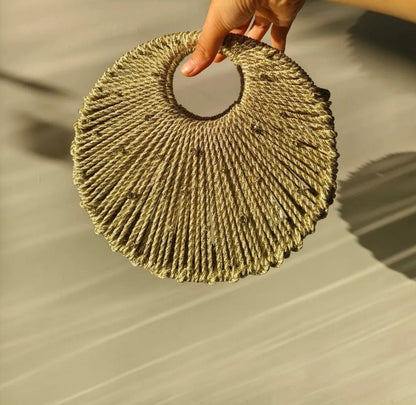 Golden Handwoven Circular Handle Statement Bag
