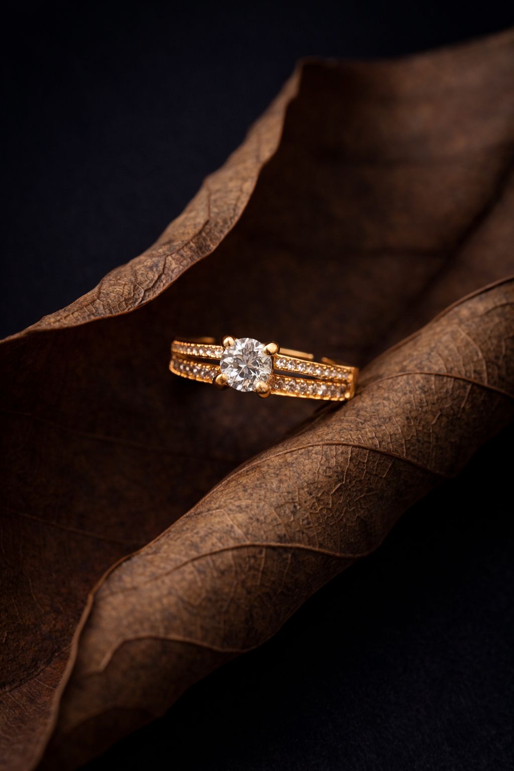 Minimalist Gold Diamond Solitaire Ring with Channel-Set Side Stones