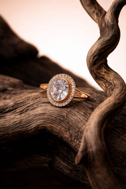Elegant Gold Oval-Cut Diamond Ring with Halo Setting