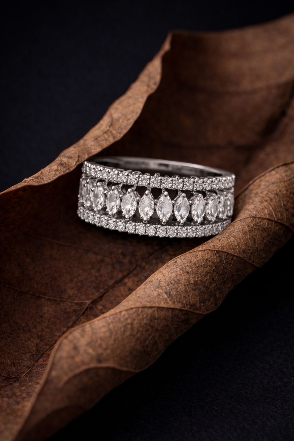 Elegant White Gold Diamond Band with Marquise-Cut Stones & Pavé Setting