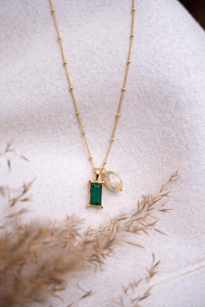 Elegant Gold Dual Pendant Necklace with Emerald-Cut Green Stone & Pearl Accent